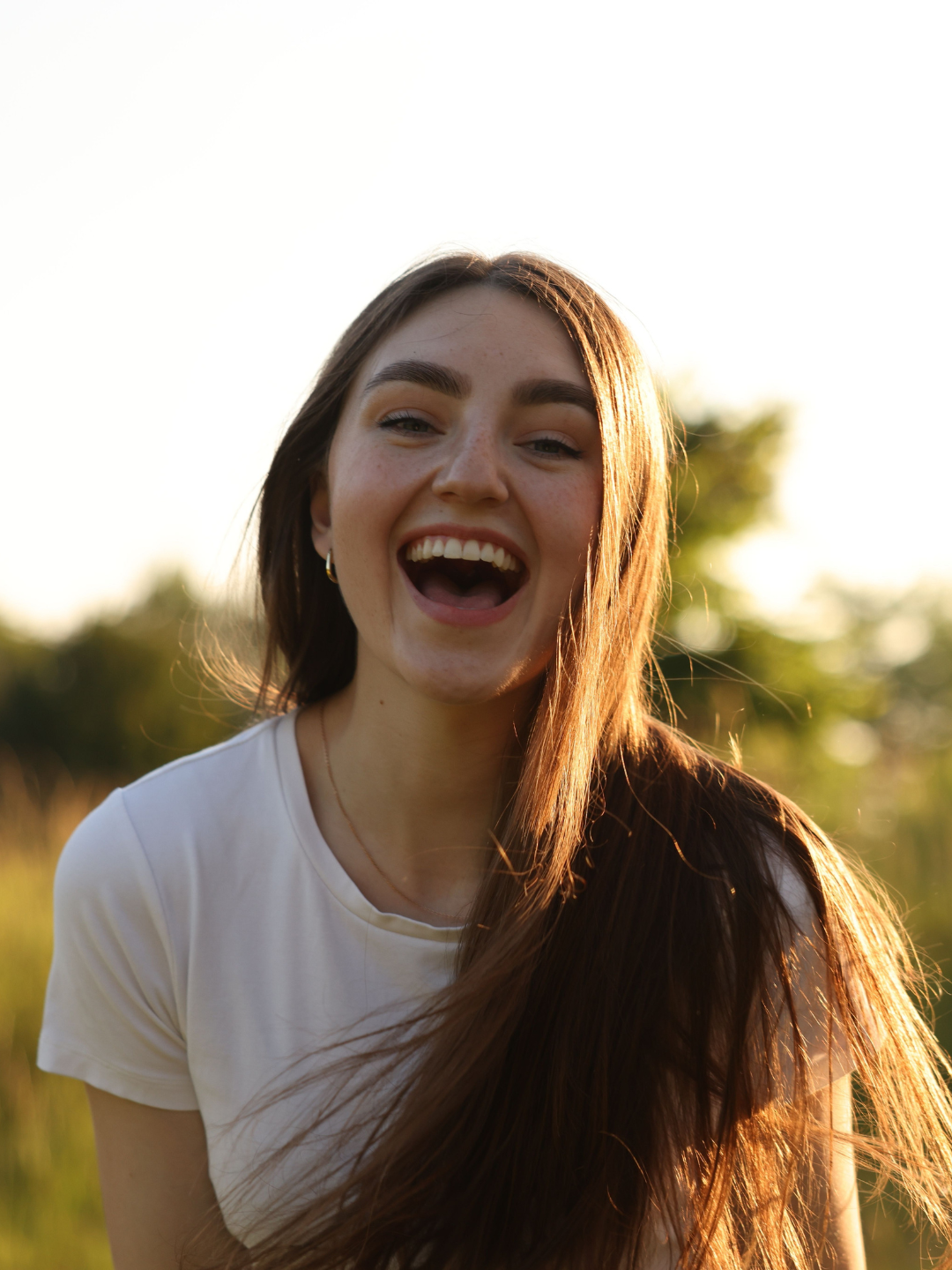 Woman experiencing peace and energy after healing her autoimmune disease